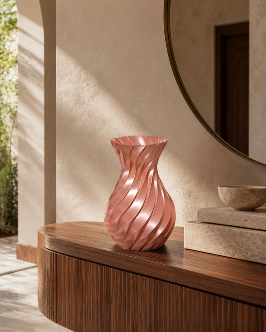 Rose Gold vase on a wooden surface with a neutral background
