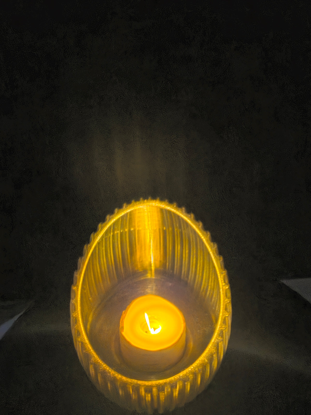 LEd teacandle on a dark background