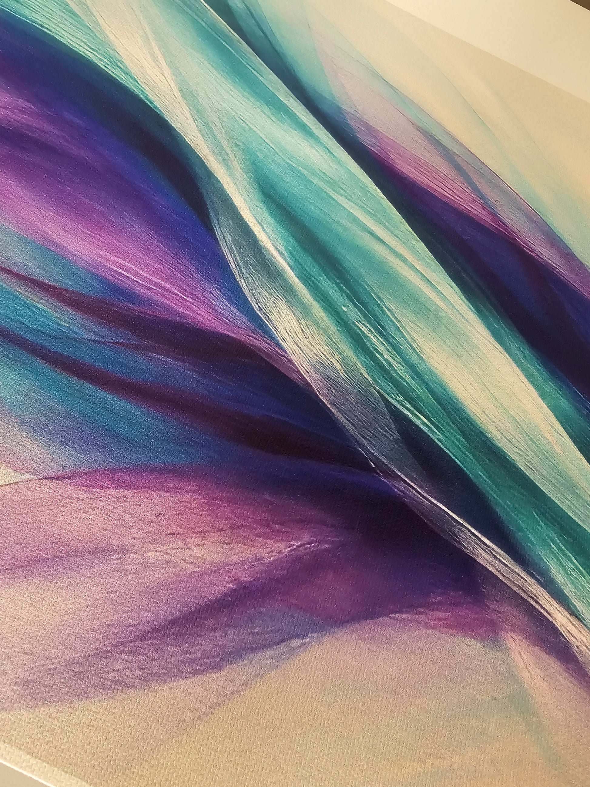 Abstract painting with purple and blue strokes on a textured surface