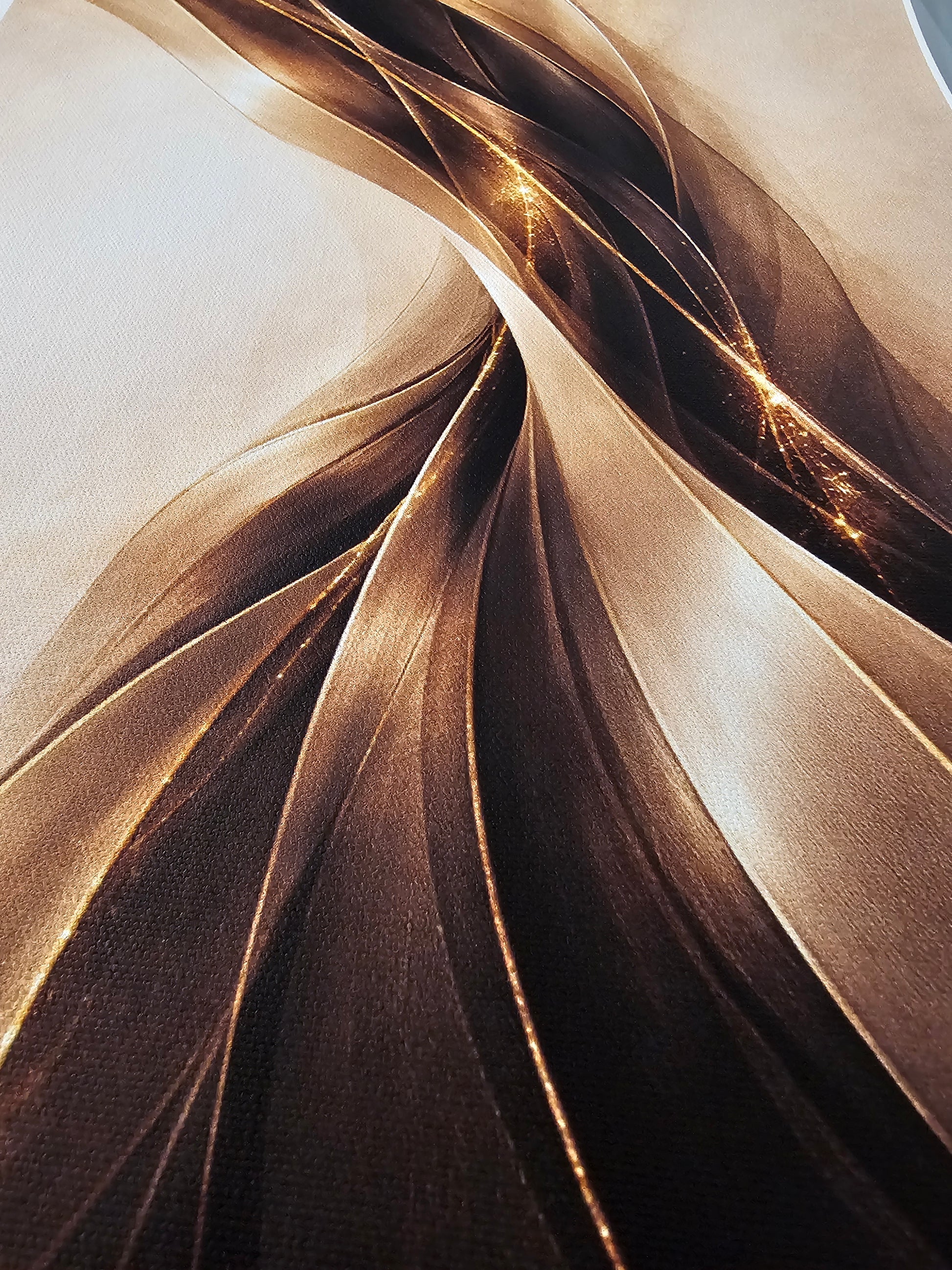 Close-up of bronze-colored fabric with a wavy pattern