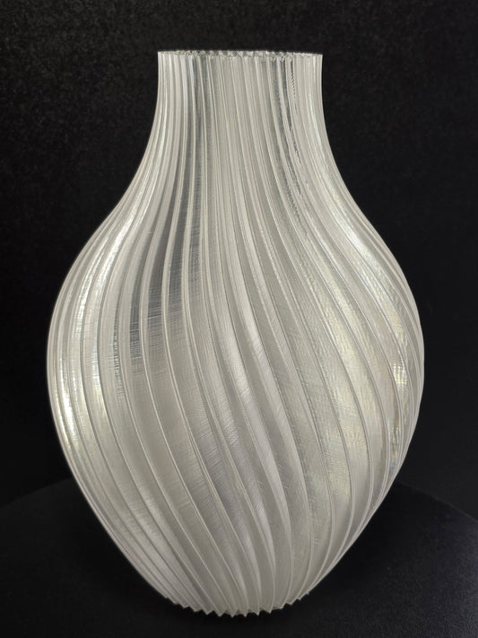 Clear Vase with Swirl Pattern on black background