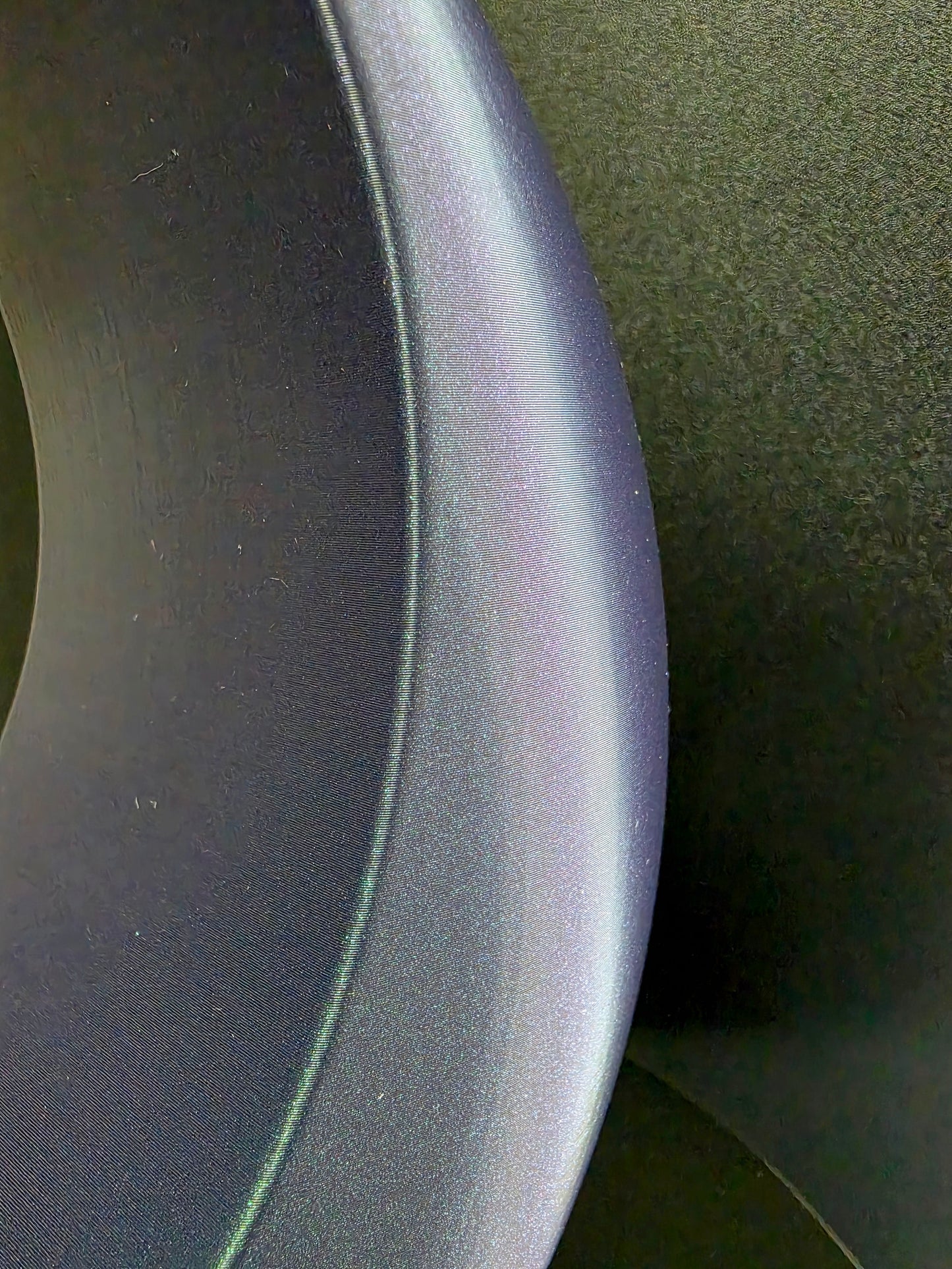 Close-up of a metallic object with a reflective surface