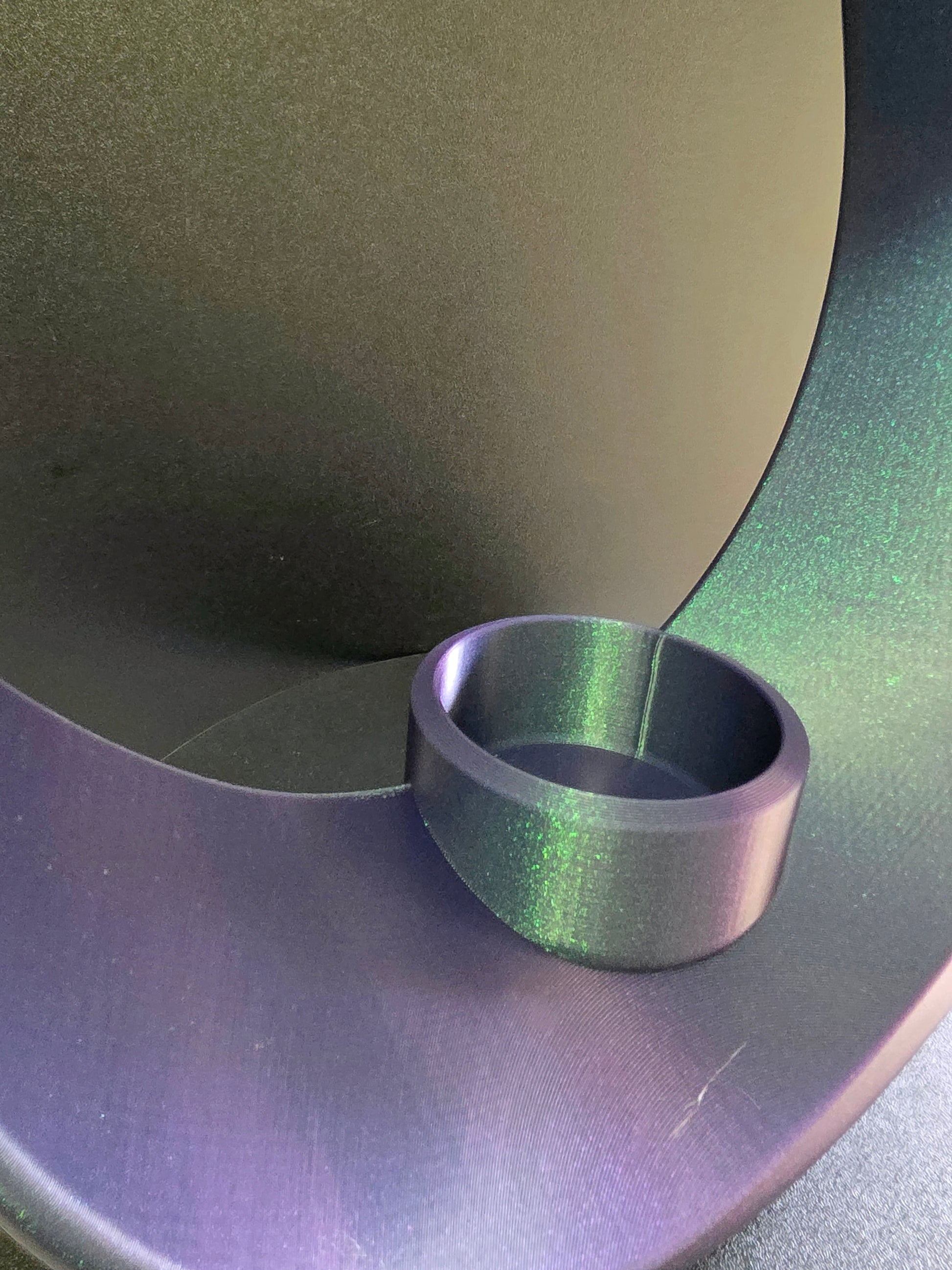 Close-up of a metallic object with a central circular component