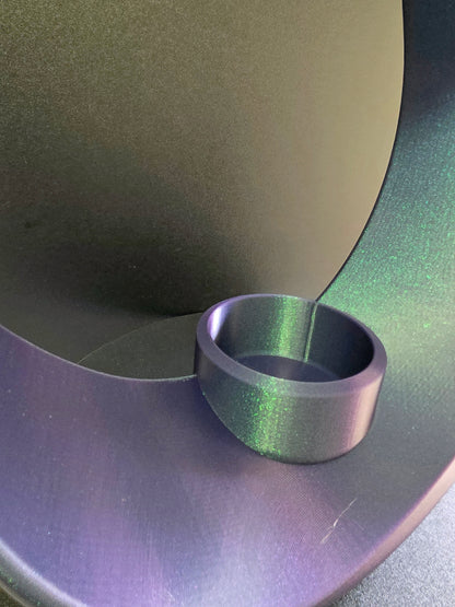 Close-up of a metallic object with a central circular component
