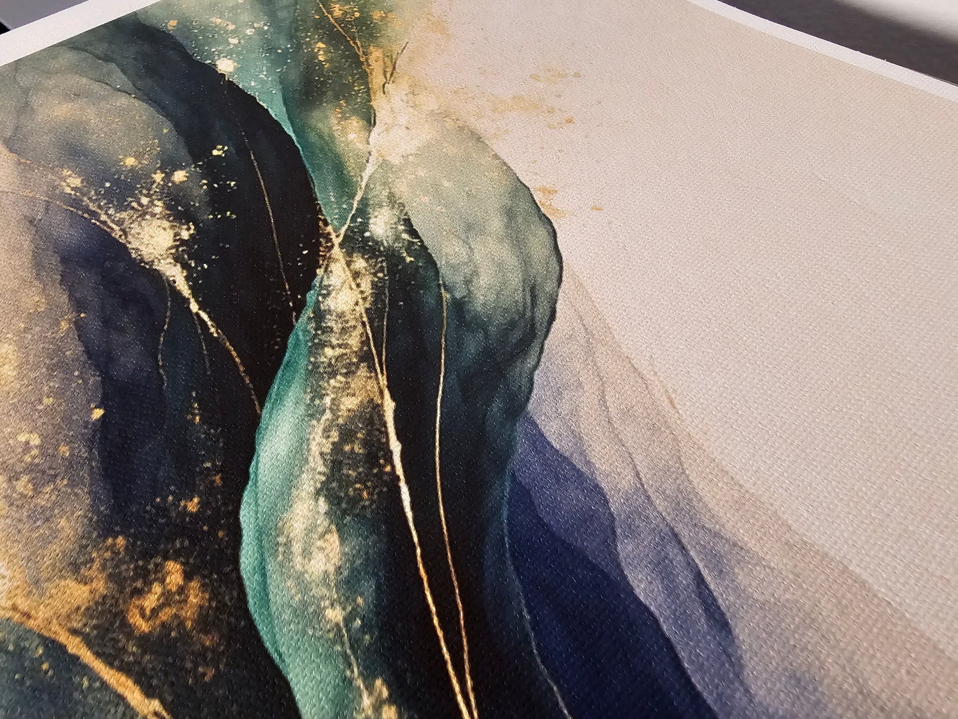 Abstract art with flowing colors on a textured surface