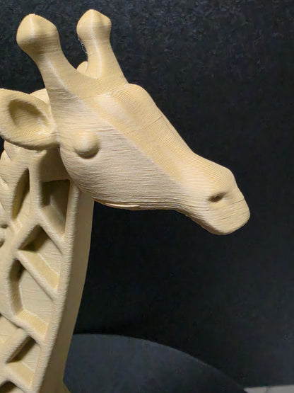 Wooden giraffe figure on a dark textured background