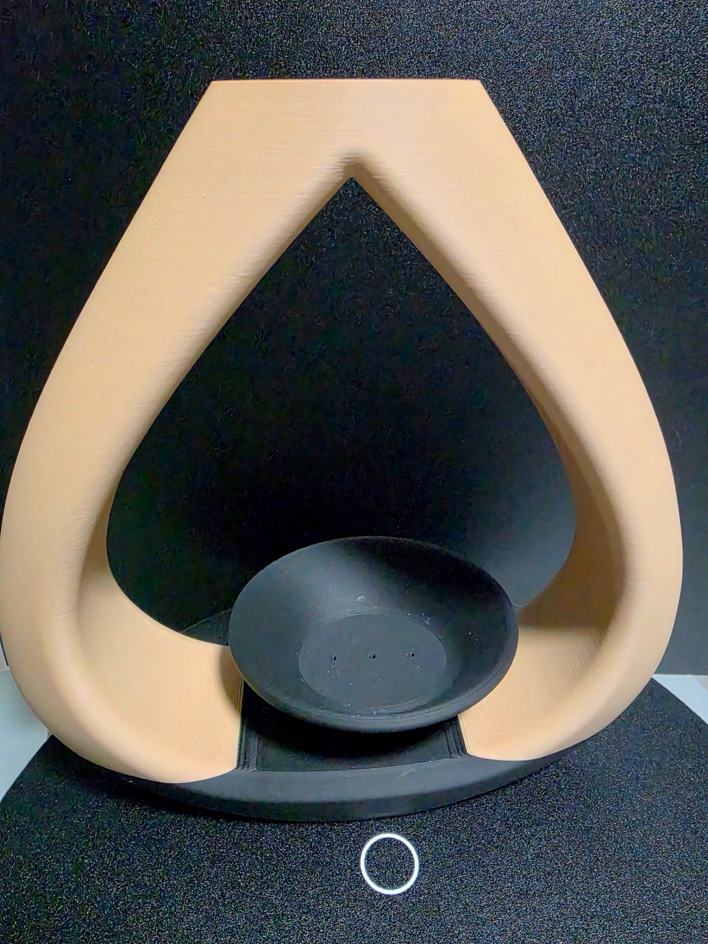 Beige and black vase with a tea candle/incense holder
