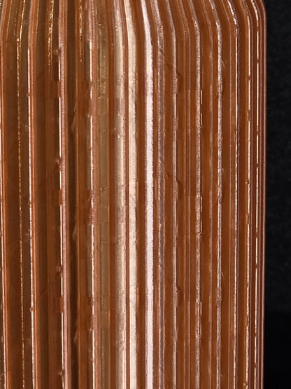 Close-up of a corrugated cardboard box with a dark background