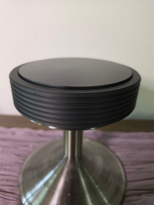 Round Rotating Art displays on pedestals