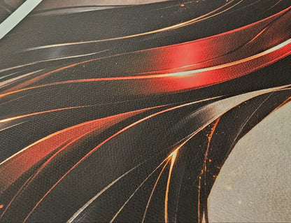 Close-up of a car's exterior with red and gold paint patterns on a dark background
