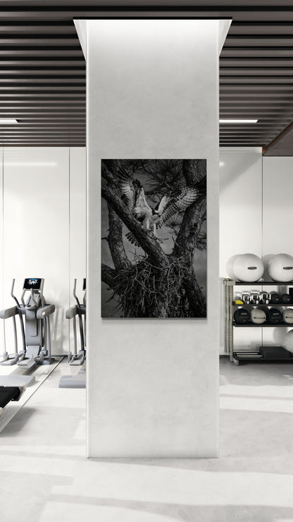 Modern interior with a black and white abstract artwork on a white wall.