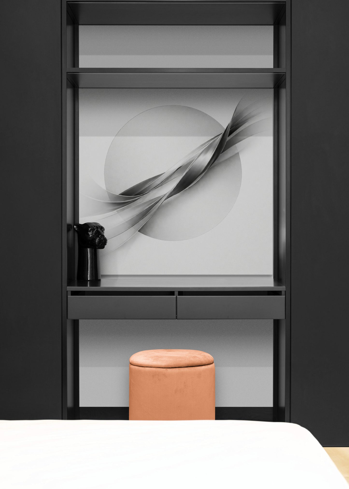 Modern interior with a black cabinet featuring abstract wall art and a pink stool.