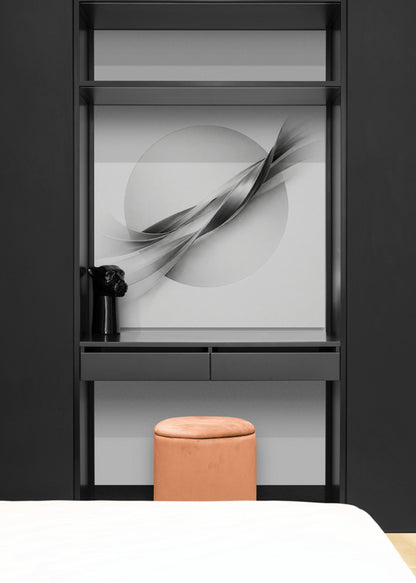 Modern interior with a black cabinet featuring abstract wall art and a pink stool.