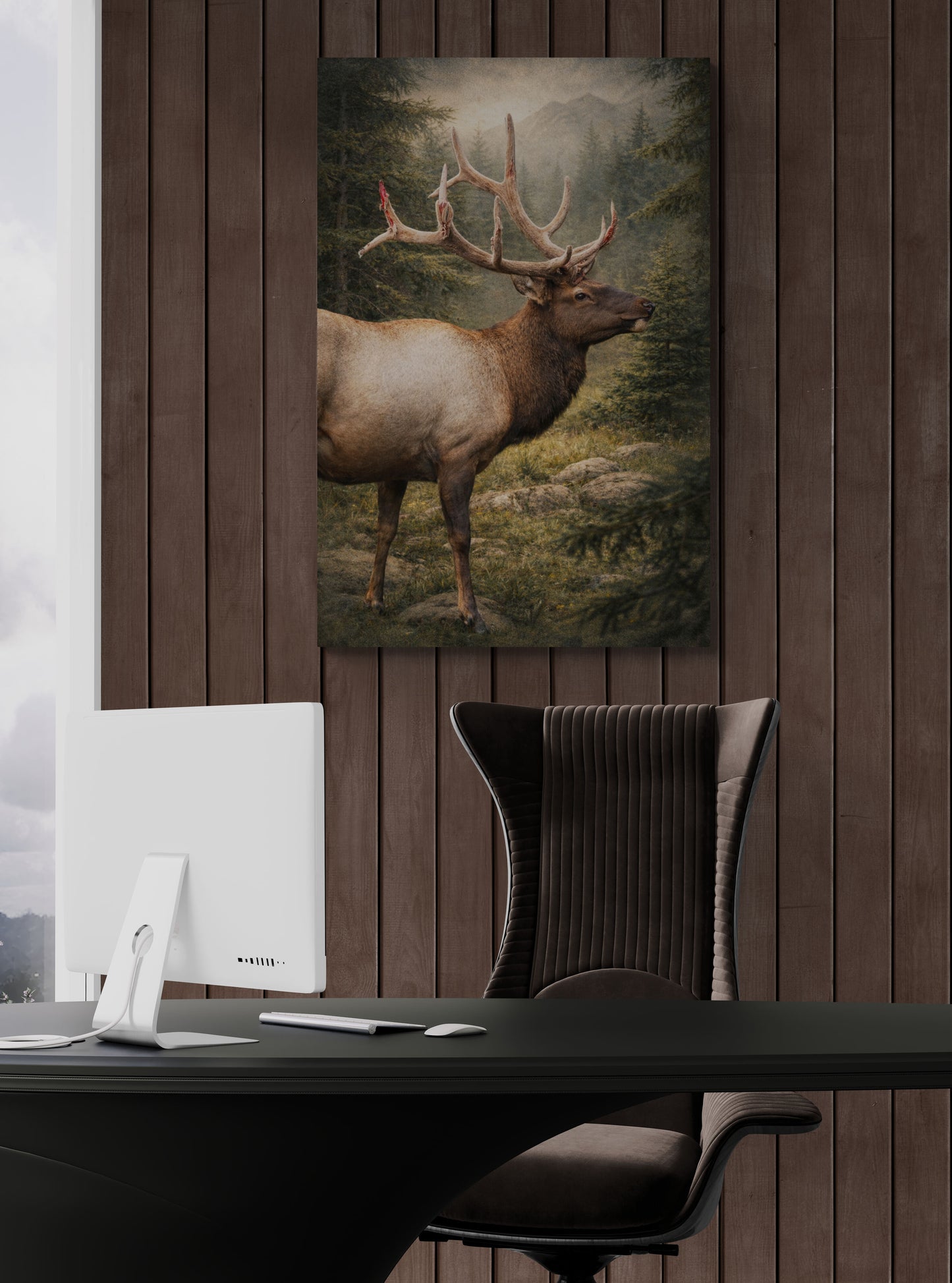Painting of a deer on a wooden wall above a desk with a chair.