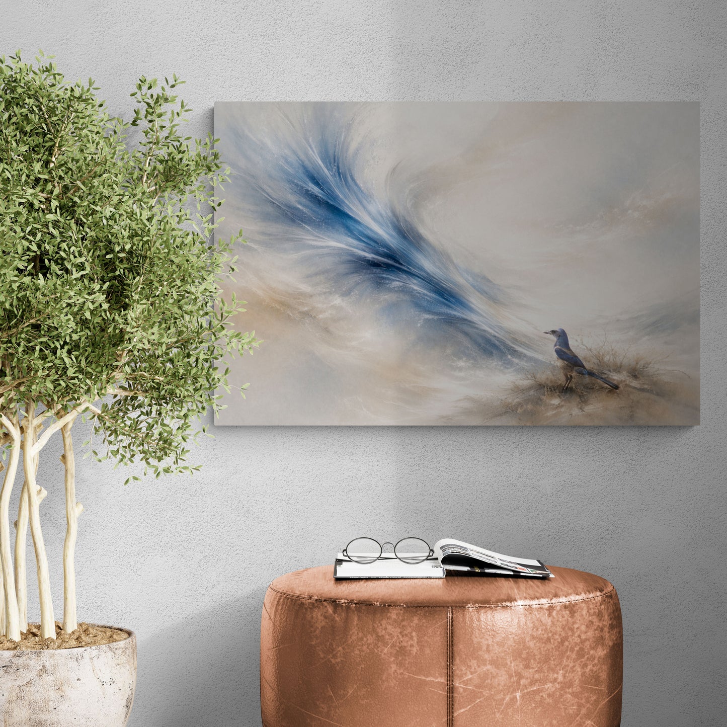 Abstract painting of a bird and feather on a wall above a brown ottoman with glasses and a book.