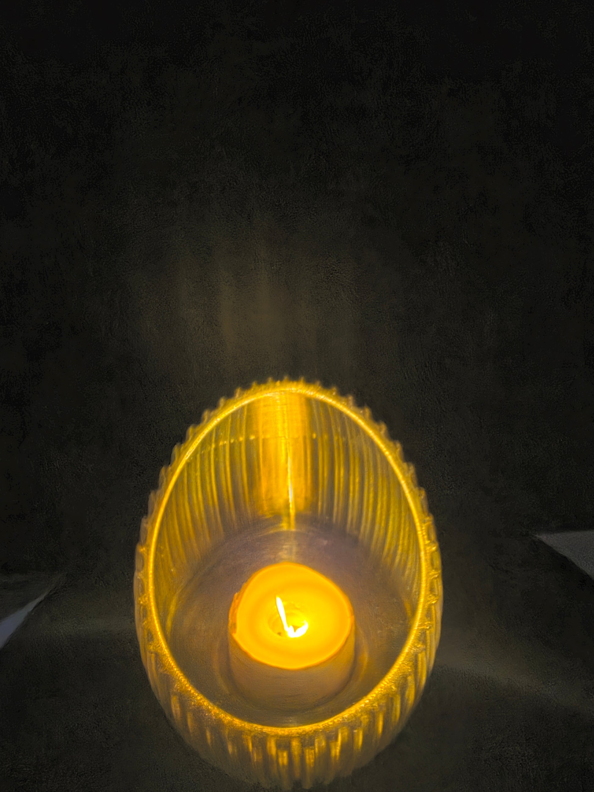 LEd teacandle on a dark background