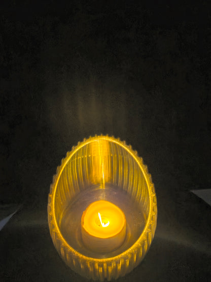LEd teacandle on a dark background